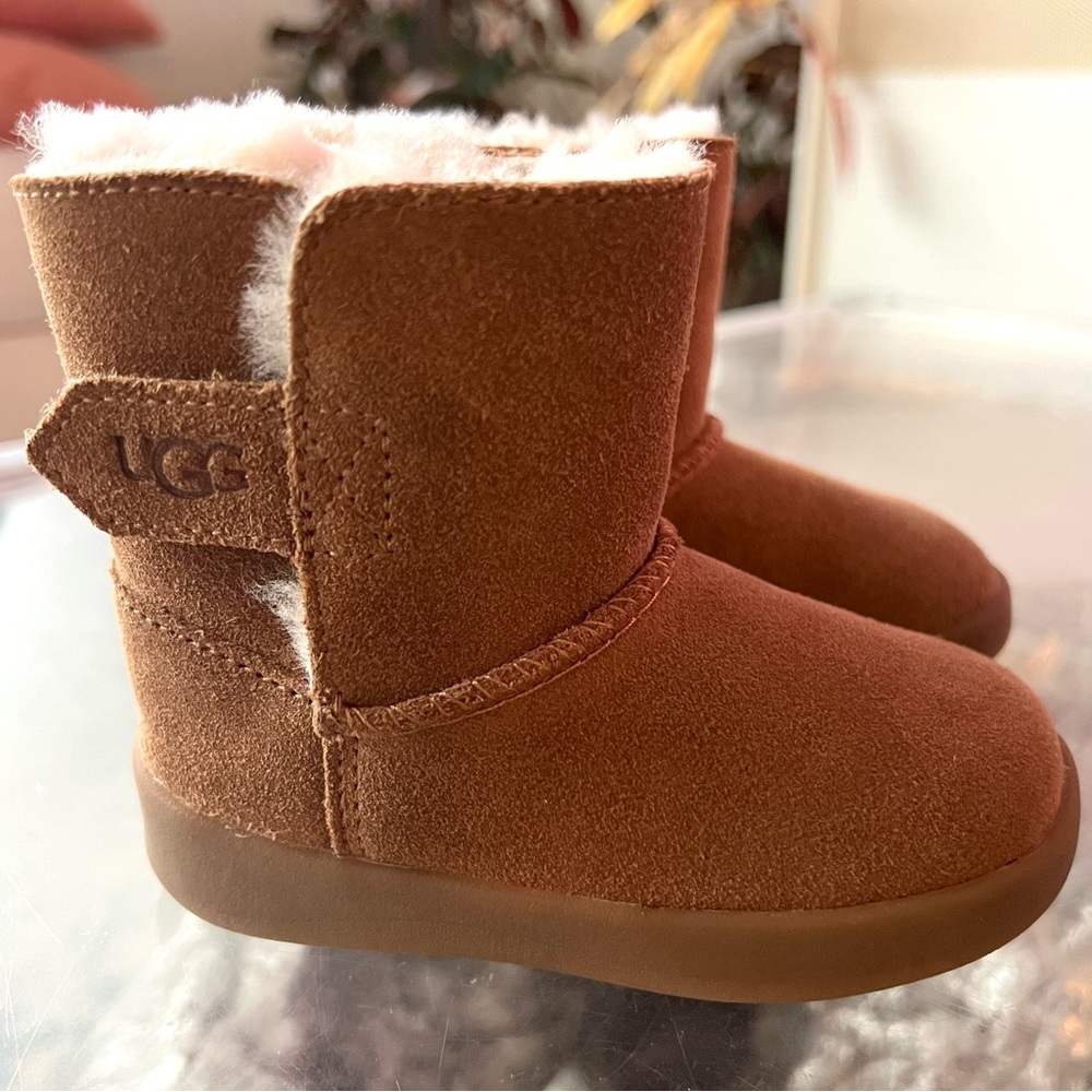 Like new Ugg boots. Toddler Size 04/05. Color: Chestnut. No box